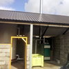 Non Domestic RHI Eco Angus Super 130kW log boiler with 10000litre Akvarterm tank for district heating installed near Bristol Somerset