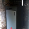 MCZ Compact 18 17kW Wood pellet boiler in an external dedicated boiler room in Devon