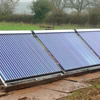 Navitron 90 tube ground rack solar thermal system combined with twin coil 5000 litre Akvarterm and 60kW log boiler for Non Domestic RHI applications, Somerset
